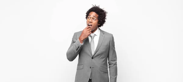 Black Afro Businessmanwith Surprised Nervous Worried Frightened Look Looking Side — Stock Photo, Image