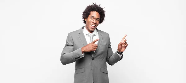 Black Afro Businessmansmiling Happily Pointing Side Upwards Both Hands Showing — Stock Photo, Image