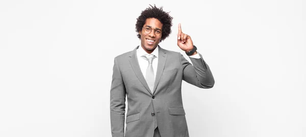 Black Afro Businessmansmiling Cheerfully Happily Pointing Upwards One Hand Copy — Stock Photo, Image