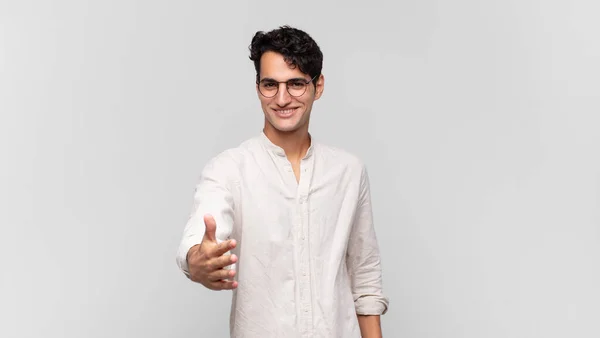 Young Handsome Man Smiling Looking Happy Confident Friendly Offering Handshake — Stock Photo, Image