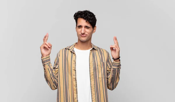 Young Handsome Man Feeling Nervous Hopeful Crossing Fingers Praying Hoping — Stock Photo, Image