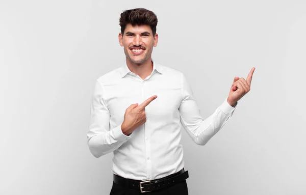 Young Handsome Man Smiling Happily Pointing Side Upwards Both Hands — Stock Photo, Image