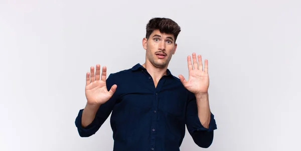 Young Handsome Man Feeling Stupefied Scared Fearing Something Frightening Hands — Stock Photo, Image