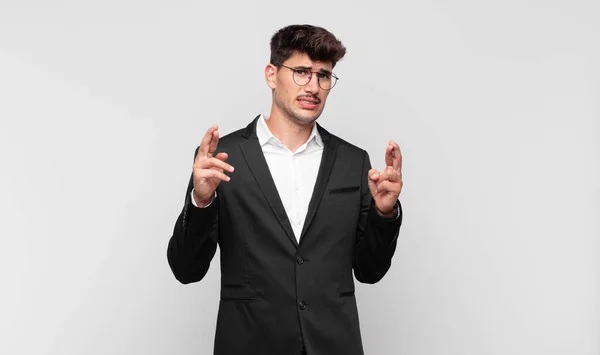 Young Handsome Man Crossing Fingers Anxiously Hoping Good Luck Worried — Stock Photo, Image