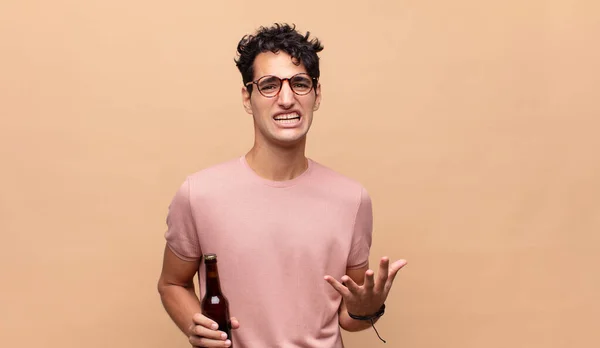 Young Man Beer Looking Desperate Frustrated Stressed Unhappy Annoyed Shouting — Stock Photo, Image