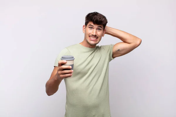 Ung Man Med Kaffe Känsla Stressad Orolig Orolig Eller Rädd — Stockfoto