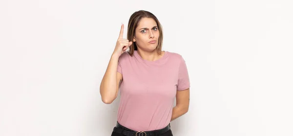 Young Blonde Woman Feeling Genius Holding Finger Proudly Air Realizing — Stock Photo, Image