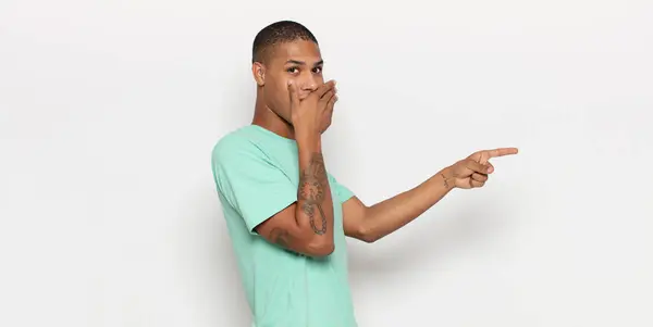 Young Black Man Feeling Happy Shocked Surprised Covering Mouth Hand — Stock Photo, Image