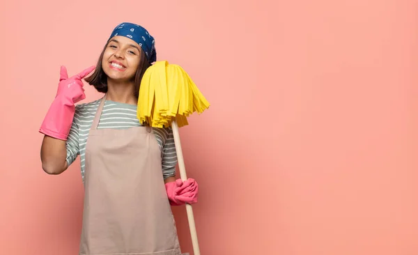 Young Woman Housekeeper Smiling Confidently Pointing Own Broad Smile Positive — Stock Photo, Image