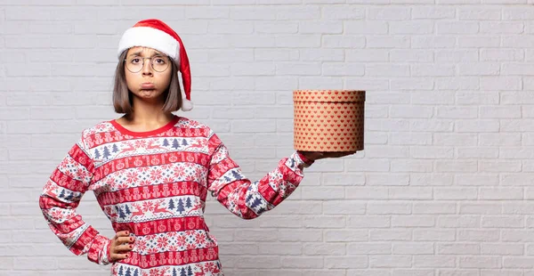 Young Woman Christmas Concept Brick Wall — Stock Photo, Image