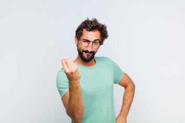 Genç sakallı adam sana borcunu ödemeni söyleyerek kapiş ya da para hareketi yapıyor.!