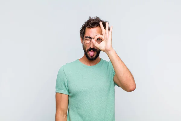 Young Bearded Man Smiling Happily Funny Face Joking Looking Peephole — Stock Photo, Image