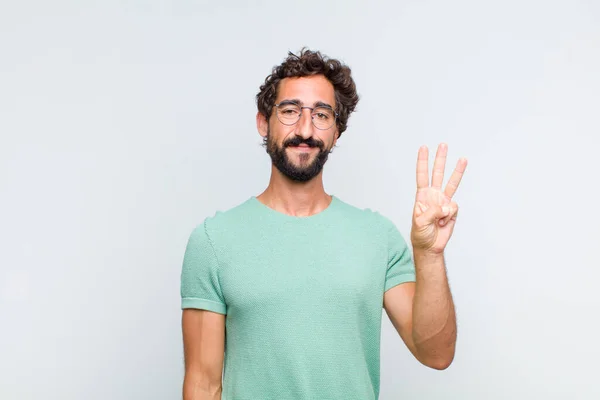 Jovem Barbudo Homem Sorrindo Olhando Amigável Mostrando Número Três Terceiro — Fotografia de Stock