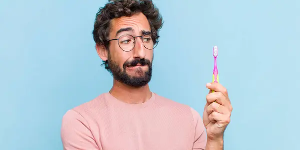 Junger Bärtiger Mann Der Zweifelt Oder Denkt Die Lippe Beißt — Stockfoto