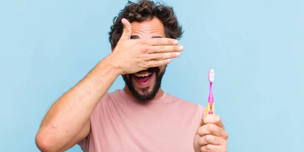 Young Bearded Man Smiling Feeling Happy Covering Eyes Both Hands — Stock Photo, Image