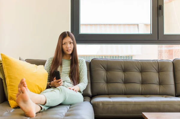 Young Asian Woman Feeling Puzzled Confused Dumb Stunned Expression Looking — Stockfoto