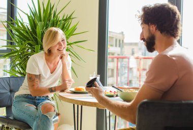 young couple breakfast concept