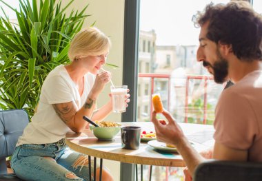 young couple breakfast concept