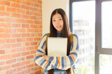 Genç Çinli güzel öğrenci.