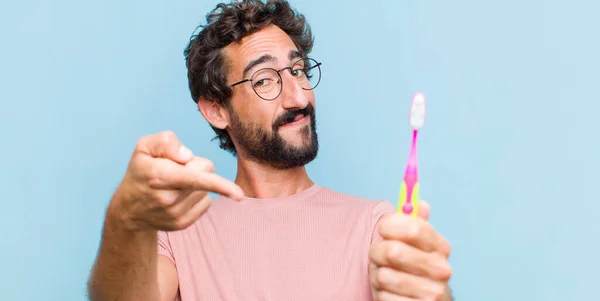Junger Mann Mit Einer Zahnbürste — Stockfoto