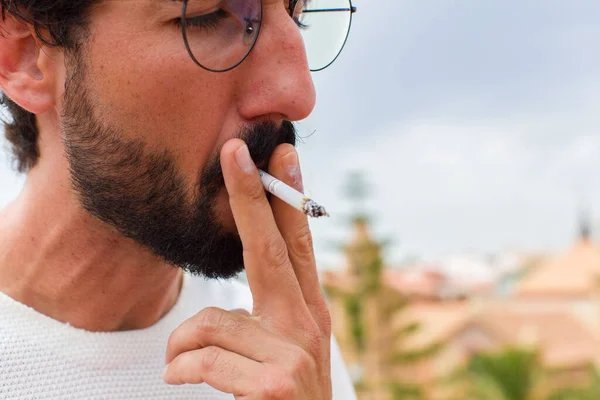 Young Bearded Man Smoking Cigarette — Stock Photo, Image