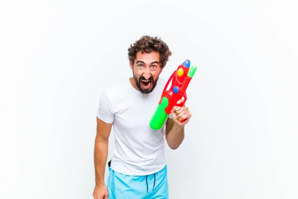 Jongeman Met Een Waterpistool — Stockfoto