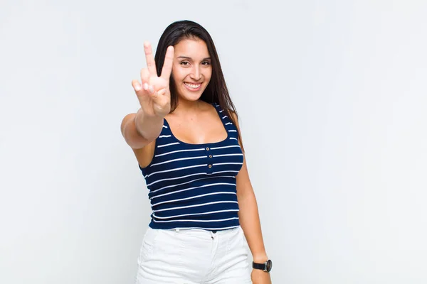 Young Woman Smiling Looking Happy Carefree Positive Gesturing Victory Peace — Stock Photo, Image