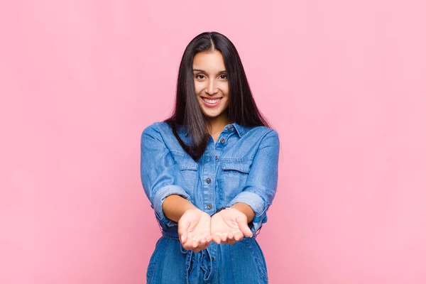 Young Woman Smiling Happily Friendly Confident Positive Look Offering Showing — Stock Photo, Image