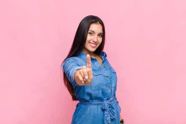 Young Woman Smiling Proudly Confidently Making Number One Pose Triumphantly — Stock Photo, Image