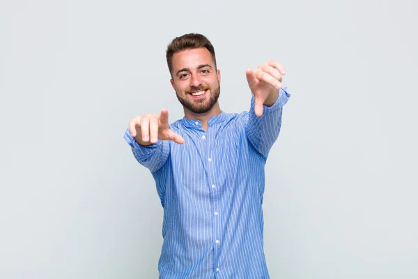 Young Man Feeling Happy Confident Pointing Camera Both Hands Laughing — Stock Photo, Image