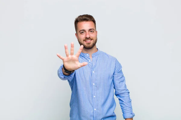 Young Man Smiling Looking Friendly Showing Number Five Fifth Hand — Stock Photo, Image