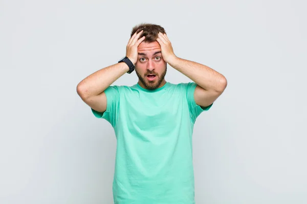 Young Man Feeling Horrified Shocked Raising Hands Head Panicking Mistake — Stock Photo, Image