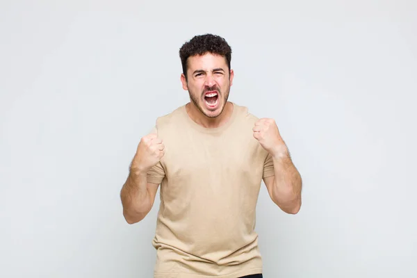 Young Man Shouting Aggressively Annoyed Frustrated Angry Look Tight Fists — Stock Photo, Image