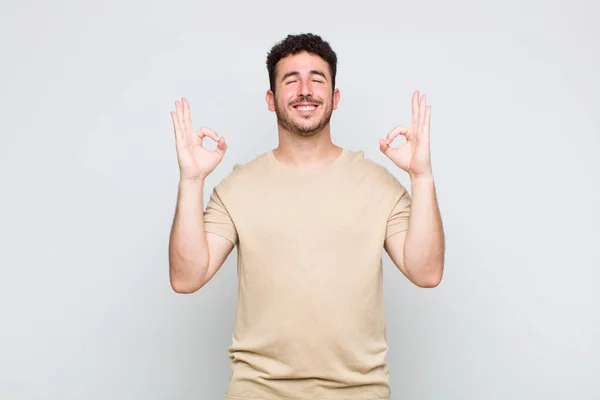 Young Man Looking Concentrated Meditating Feeling Satisfied Relaxed Thinking Making — Stock Photo, Image