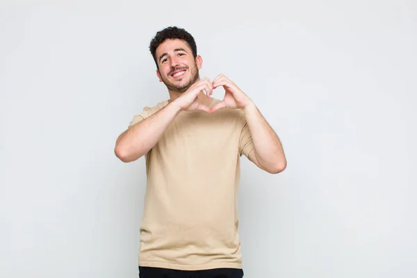 Young Man Smiling Feeling Happy Cute Romantic Love Making Heart — Stock Photo, Image
