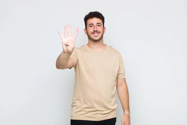 Young Man Smiling Looking Friendly Showing Number Four Fourth Hand — Stock Photo, Image