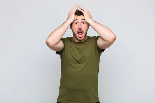 Young Man Raising Hands Head Open Mouthed Feeling Extremely Lucky — Stock Photo, Image