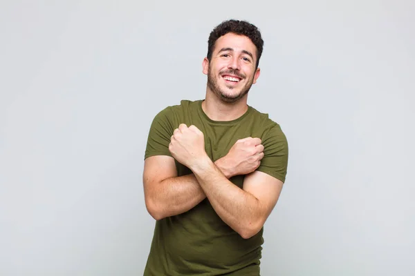Young Man Smiling Cheerfully Celebrating Fists Clenched Arms Crossed Feeling — Stock Photo, Image