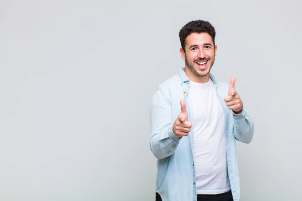 Young Man Feeling Happy Cool Satisfied Relaxed Successful Pointing Camera — Stock Photo, Image
