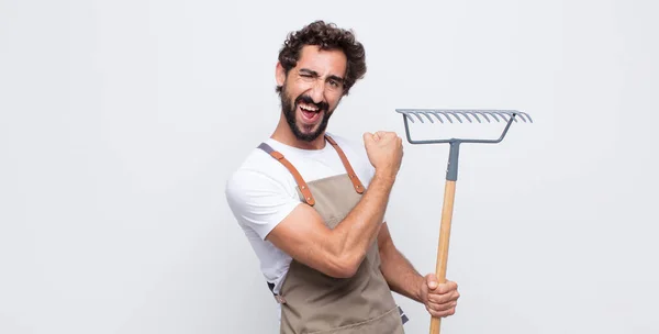 Young Man Feeling Happy Satisfied Powerful Flexing Fit Muscular Biceps — Stock Photo, Image