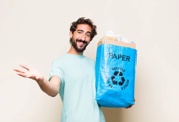 Young Man Smiling Cheerfully Giving Warm Friendly Loving Welcome Hug — Stock Photo, Image