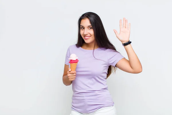 Pretty Woman Smiling Happily Cheerfully Waving Hand Welcoming Greeting You — Stock Photo, Image