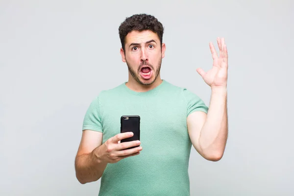 Young Man Screaming Hands Air Feeling Furious Frustrated Stressed Upset — Stock Photo, Image