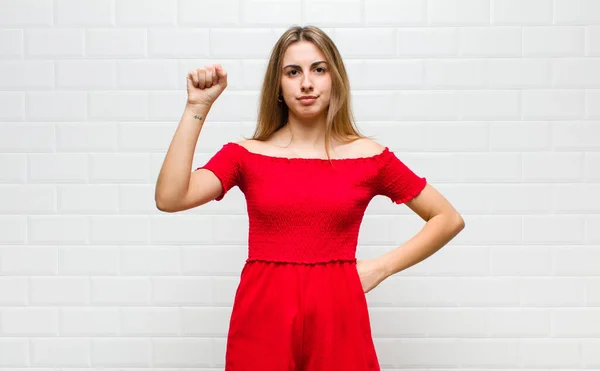 Blonde Woman Feeling Serious Strong Rebellious Raising Fist Protesting Fighting — Stock Photo, Image