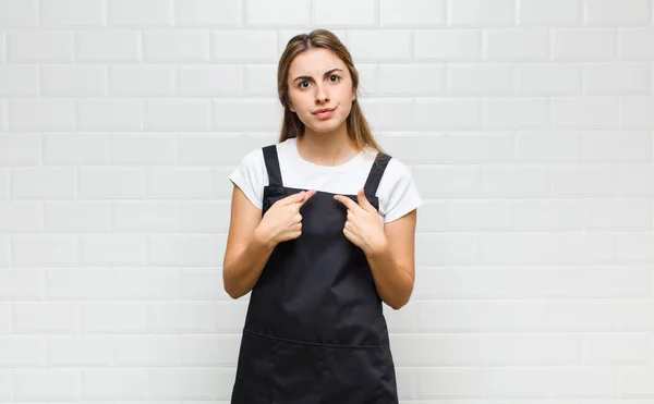 Blonde Woman Pointing Self Confused Quizzical Look Shocked Surprised Chosen — Stock Photo, Image