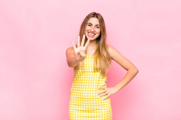 Blonde Woman Smiling Looking Friendly Showing Number Four Fourth Hand — Stock Photo, Image