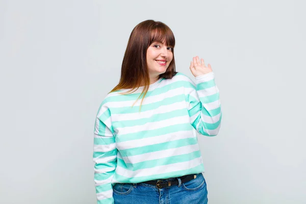 Overweight Woman Smiling Happily Cheerfully Waving Hand Welcoming Greeting You — Stock Photo, Image