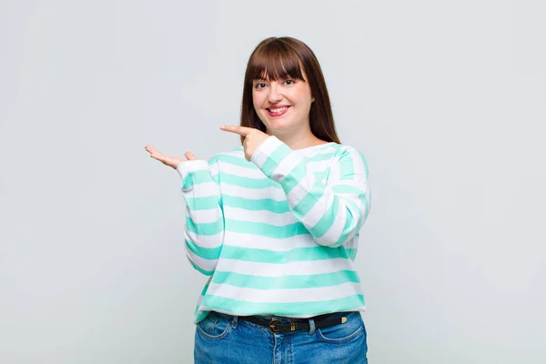 Overweight Woman Smiling Cheerfully Pointing Copy Space Palm Side Showing — Stock Photo, Image