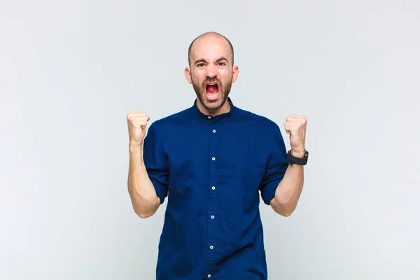 Bald Man Shouting Aggressively Angry Expression Fists Clenched Celebrating Success — Stock Photo, Image