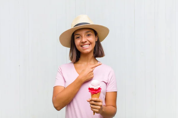 Young Hispanic Woman Smiling Cheerfully Feeling Happy Pointing Side Upwards — Stock Photo, Image